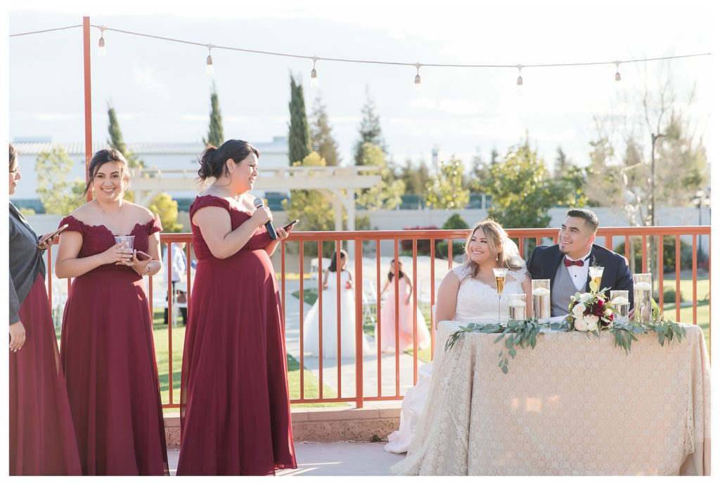 a bridesmaid gives a toast at a wedding at KLEA Banquet Hall