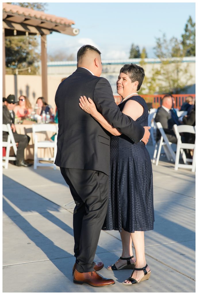 groom dances with his mother at his wedding at KLEA Banquet Hall