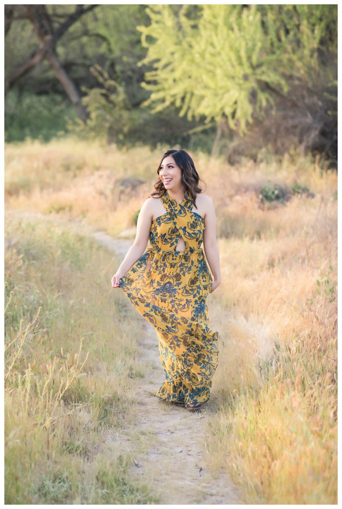 a bride twirling during her Kern County engagement photos