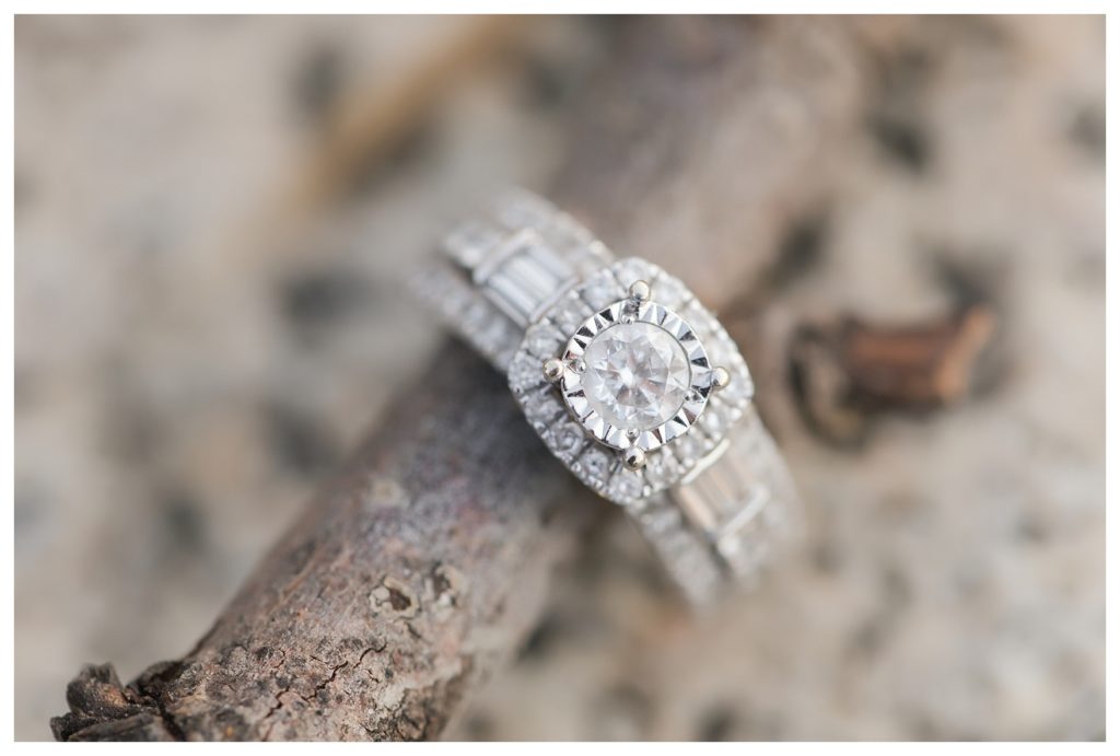 a beautiful engagement ring during Harley Davidson engagement photos