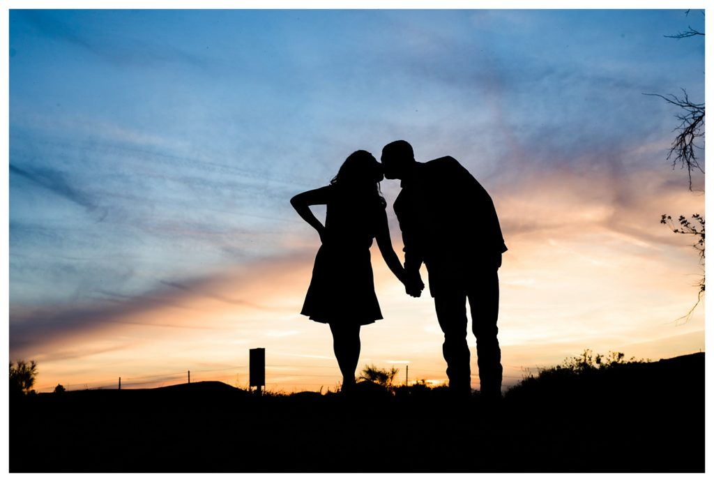 a sunset silhouette during Kern County engagement photos