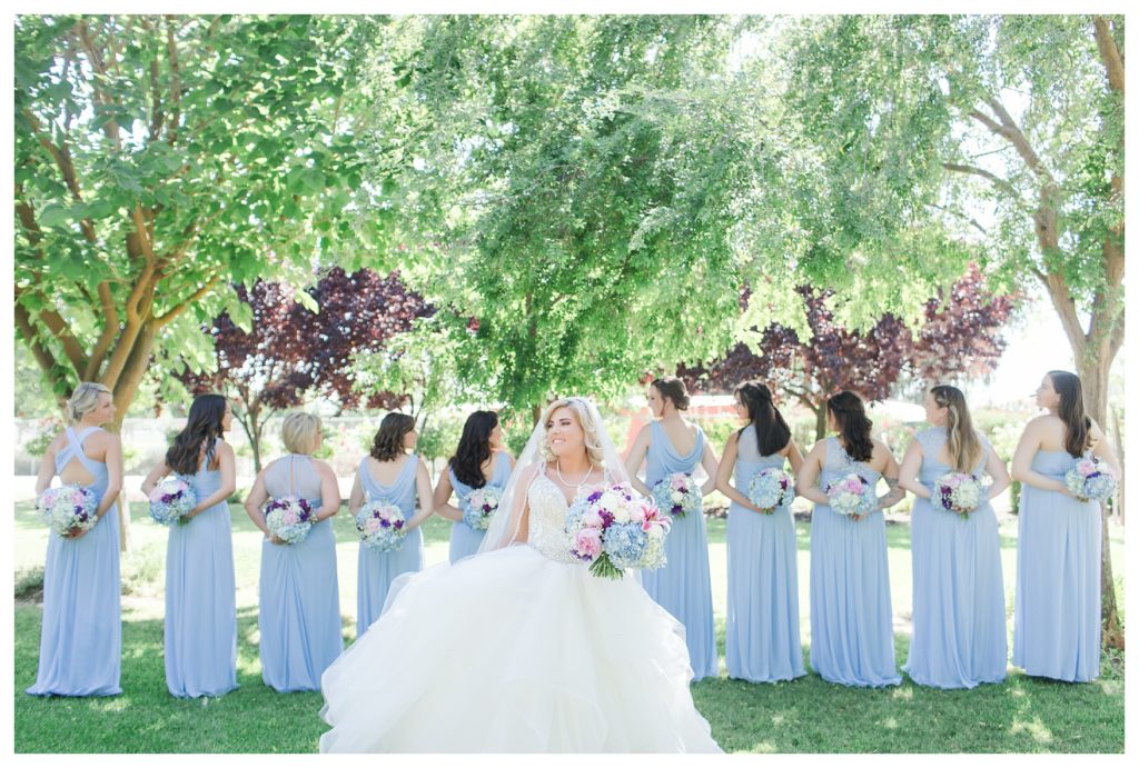 Park Place Events Wedding - bride twirling under a large tree