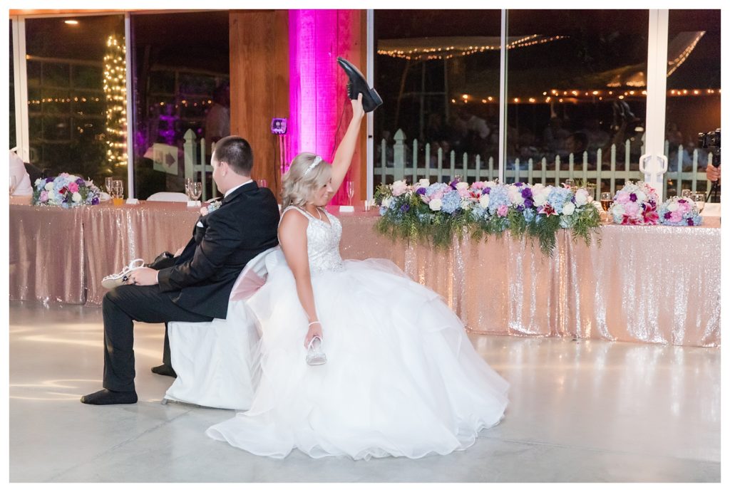 Park Place Events Wedding - bride and groom play the shoe game
