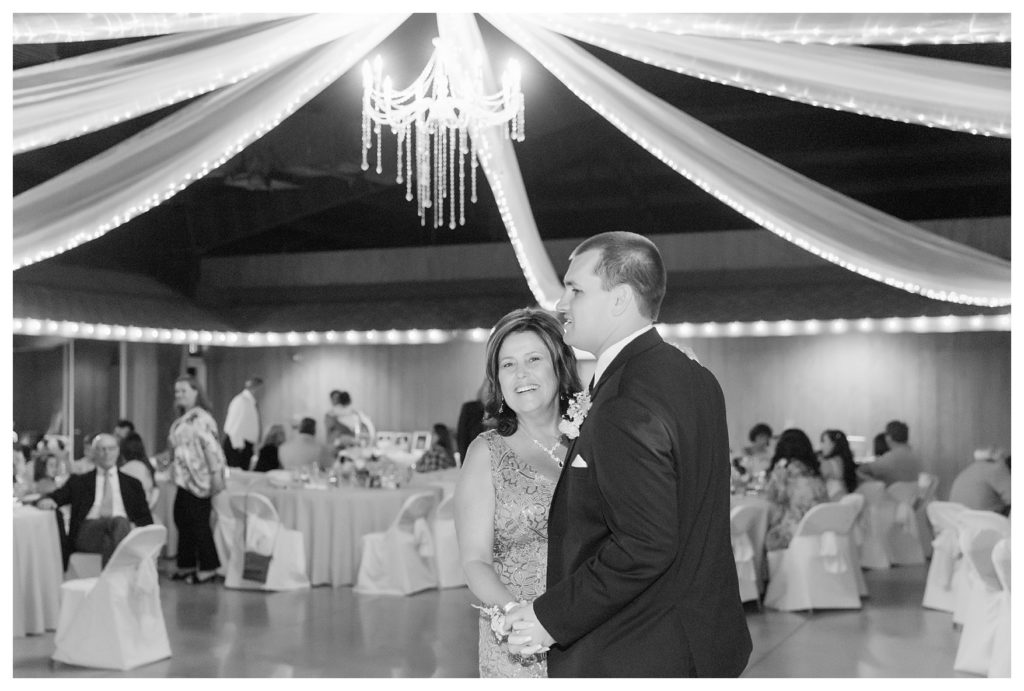Disney themed wedding - groom dancing with his mother