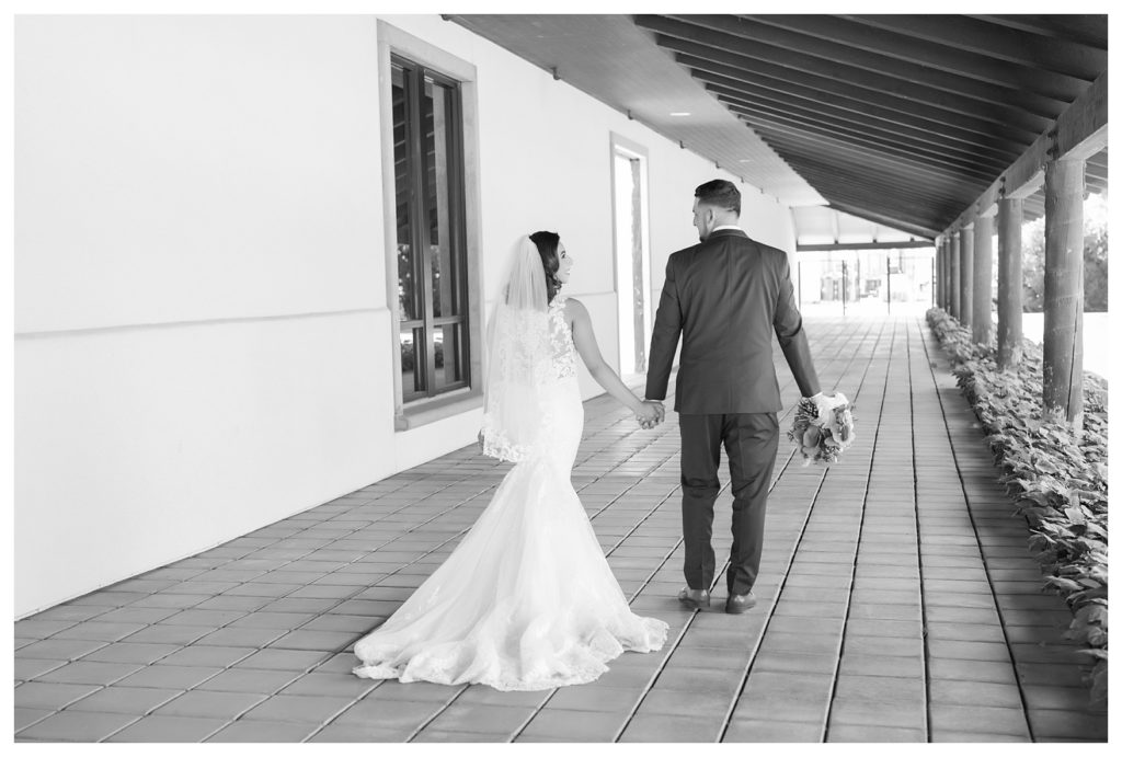 Rancho Janitzio Wedding - bride and groom walking away