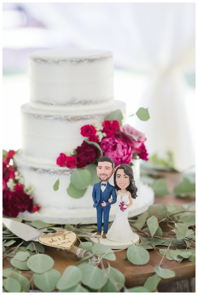 Rancho Janitzio Wedding - wedding cake with bobblehead cake topper