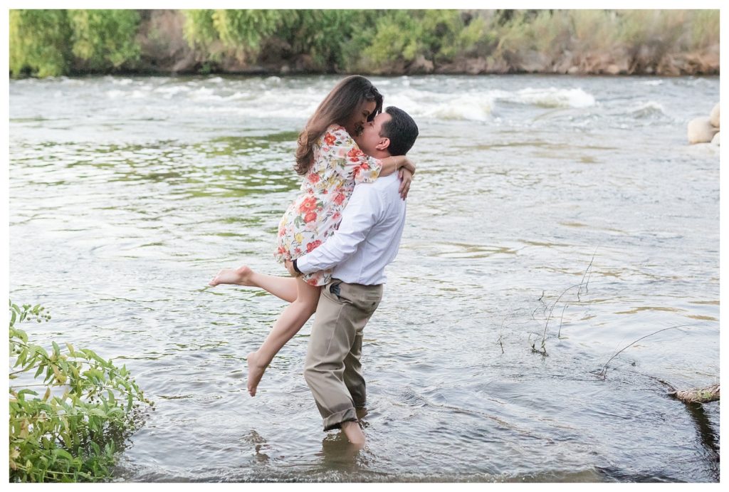 playing in the water during an engagement session at Kern River