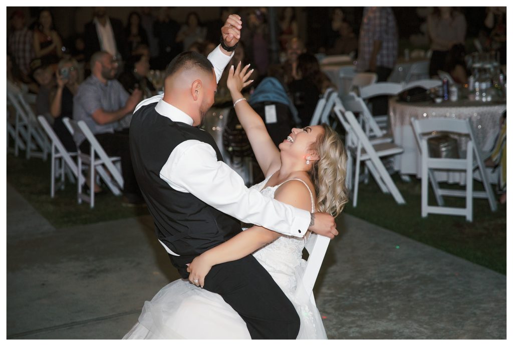 bride and groom dance during their wedding at The Gardens at Mill Creek
