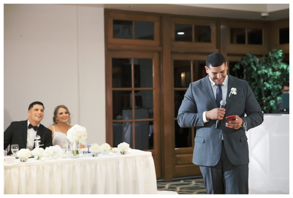 a groomsman gives a speech during a Rio Bravo Country Club wedding reception