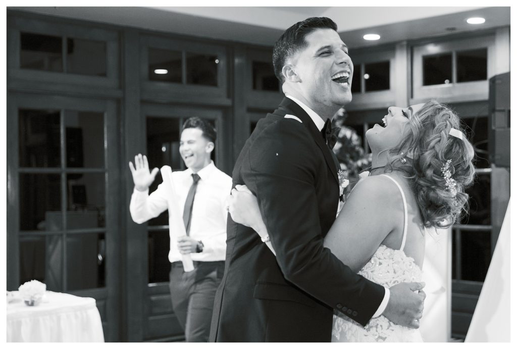 bride and groom laugh during their first dance at their Rio Bravo Country Club wedding reception