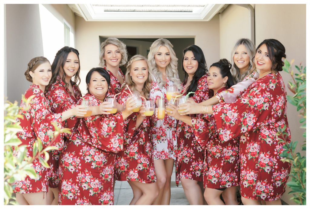 a bride toasts her bridesmaids before her wedding at JEH Ranch