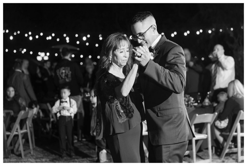 a mother and son dance at a wedding at JEH Ranch