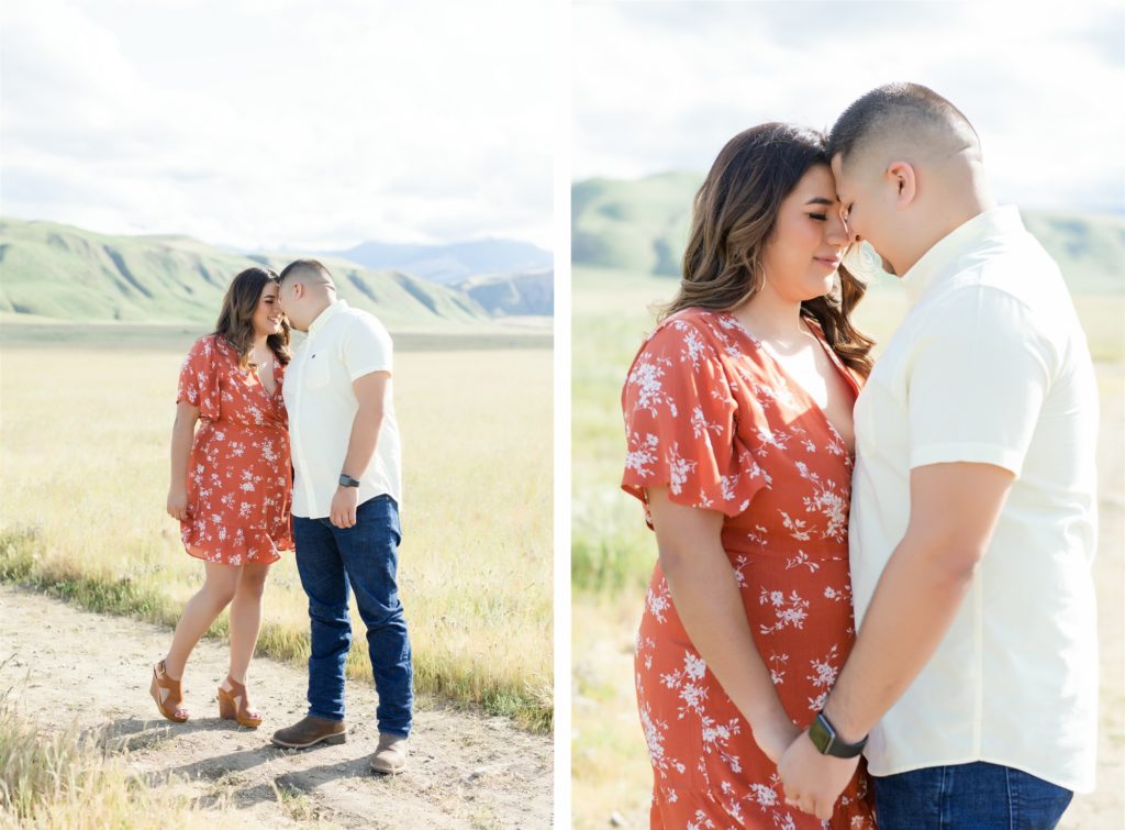 a couple cuddles during engagement photos at Wind Wolves Preserve