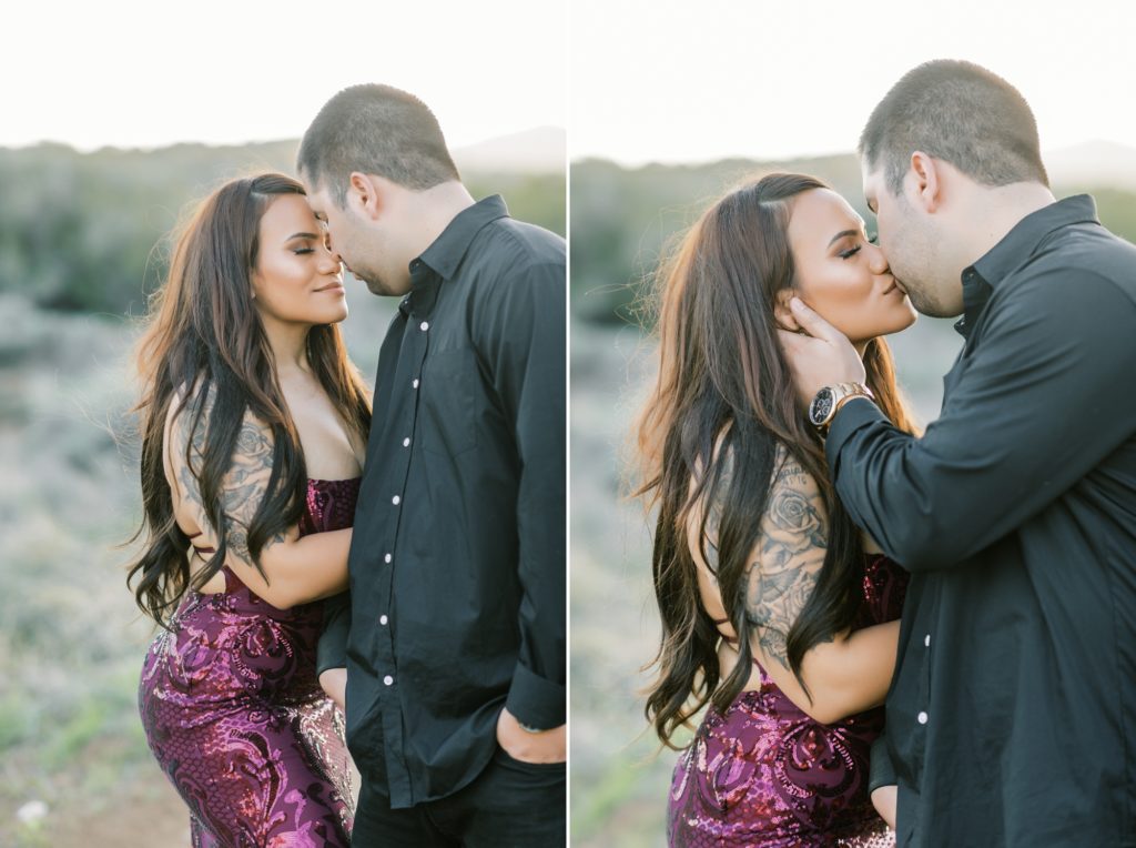 a couple kisses during photos in the desert