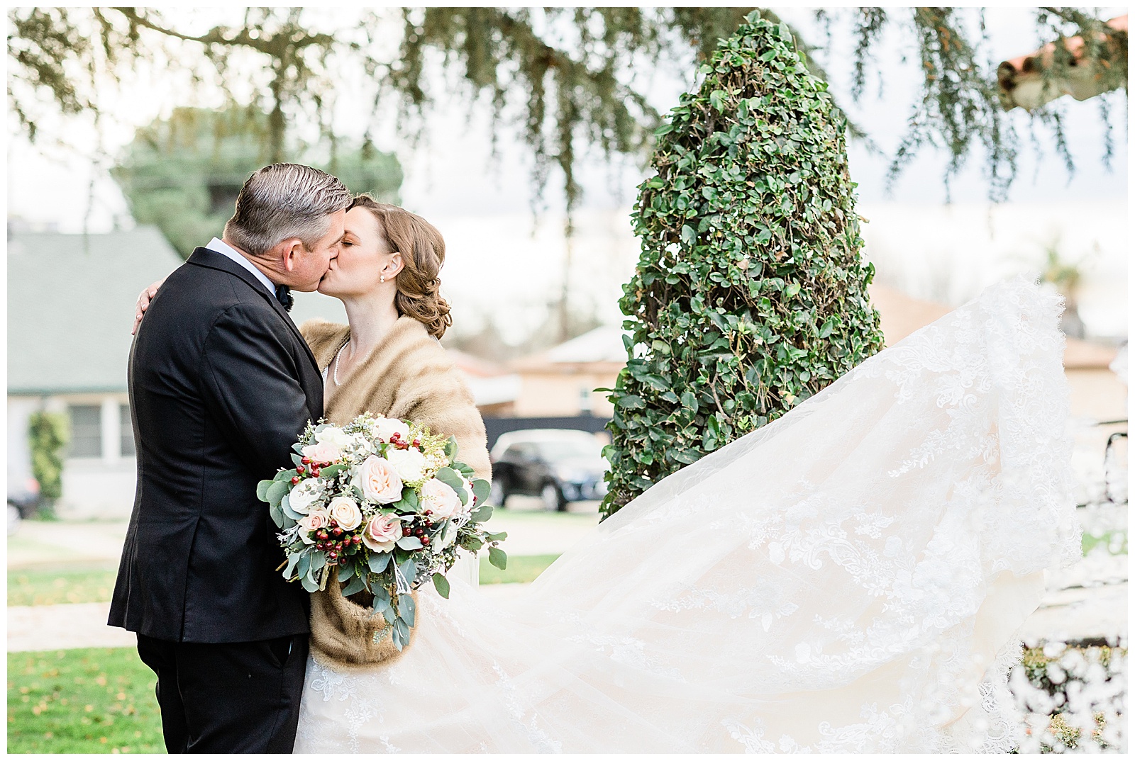 a bride and groom kiss after their winter wedding in Bakersfield, CA