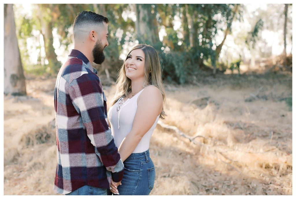 beautiful couple taking engagement photos in Bakersfield, CA