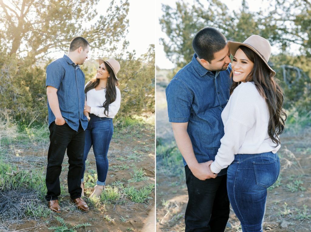 couple snuggles during engagement photos at Sand Canyon Ranch